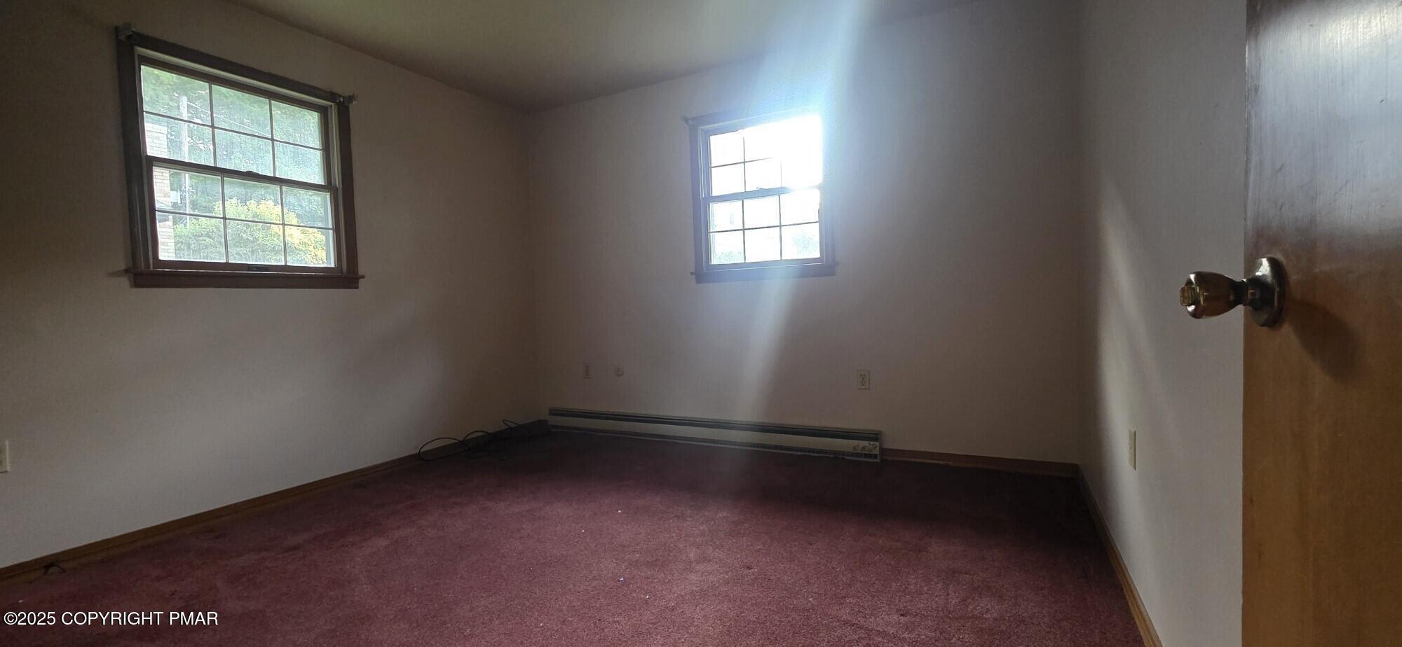1829 South Webster Avenue Scranton, PA 18505 - Photo 22 of 40 an empty room with windows