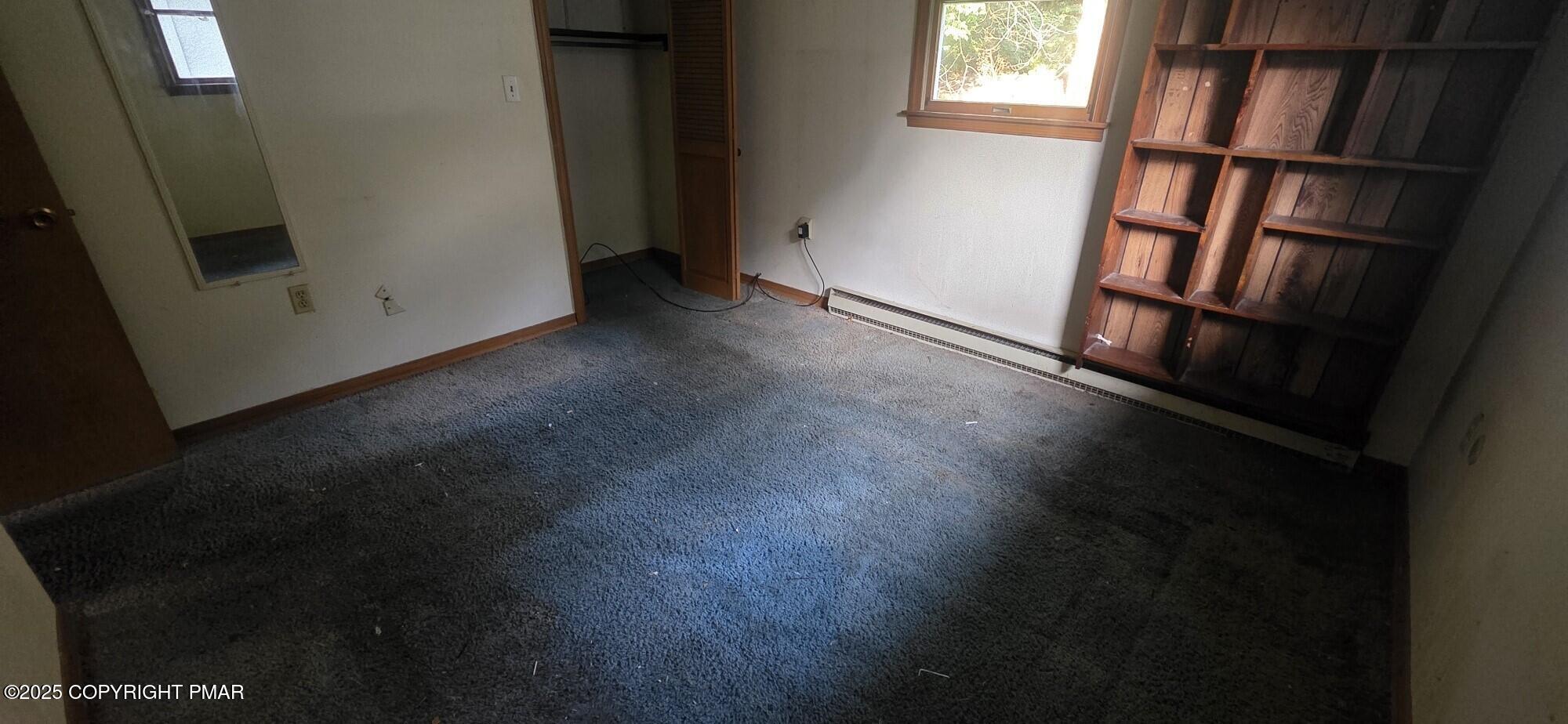 1829 South Webster Avenue Scranton, PA 18505 - Photo 26 of 40 a view of empty room with window and fireplace
