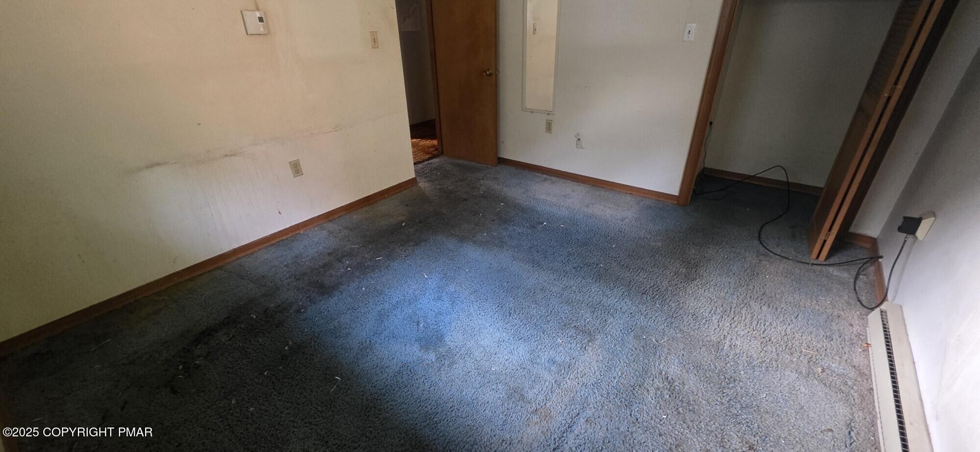 1829 South Webster Avenue Scranton, PA 18505 - Photo 27 of 40 a view of a room with wooden floor and a window