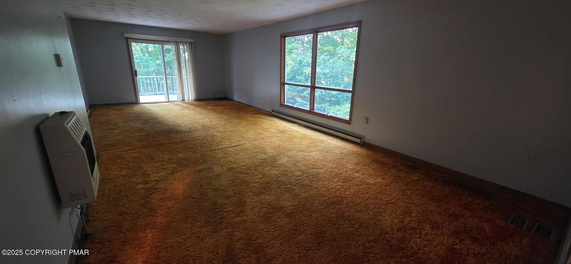 1829 South Webster Avenue Scranton, PA 18505 - Photo 3 of 40 an empty room with windows