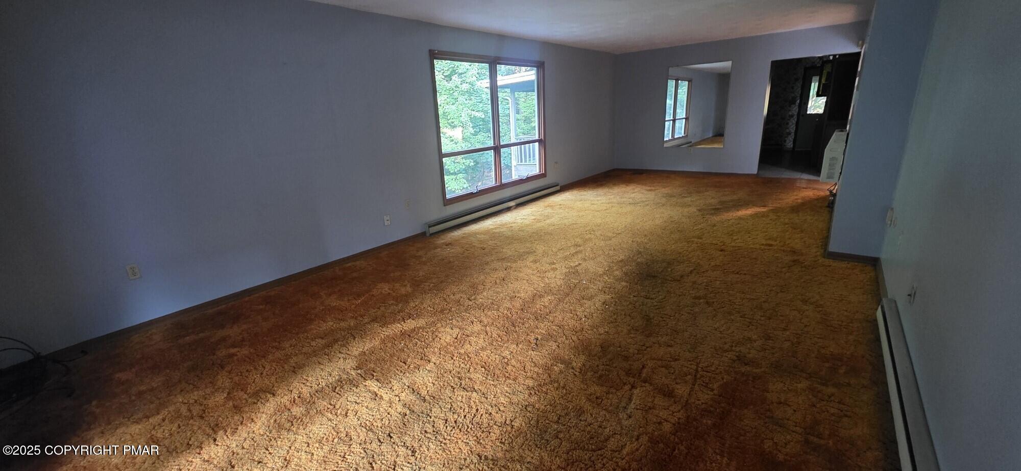 1829 South Webster Avenue Scranton, PA 18505 - Photo 5 of 40 a view of an empty room and window