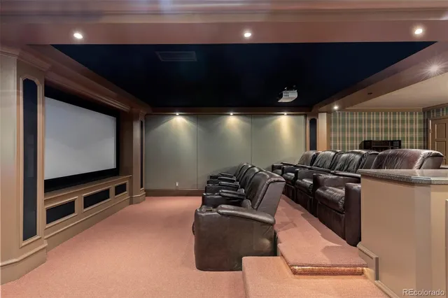 a projector room with furniture projector and screen