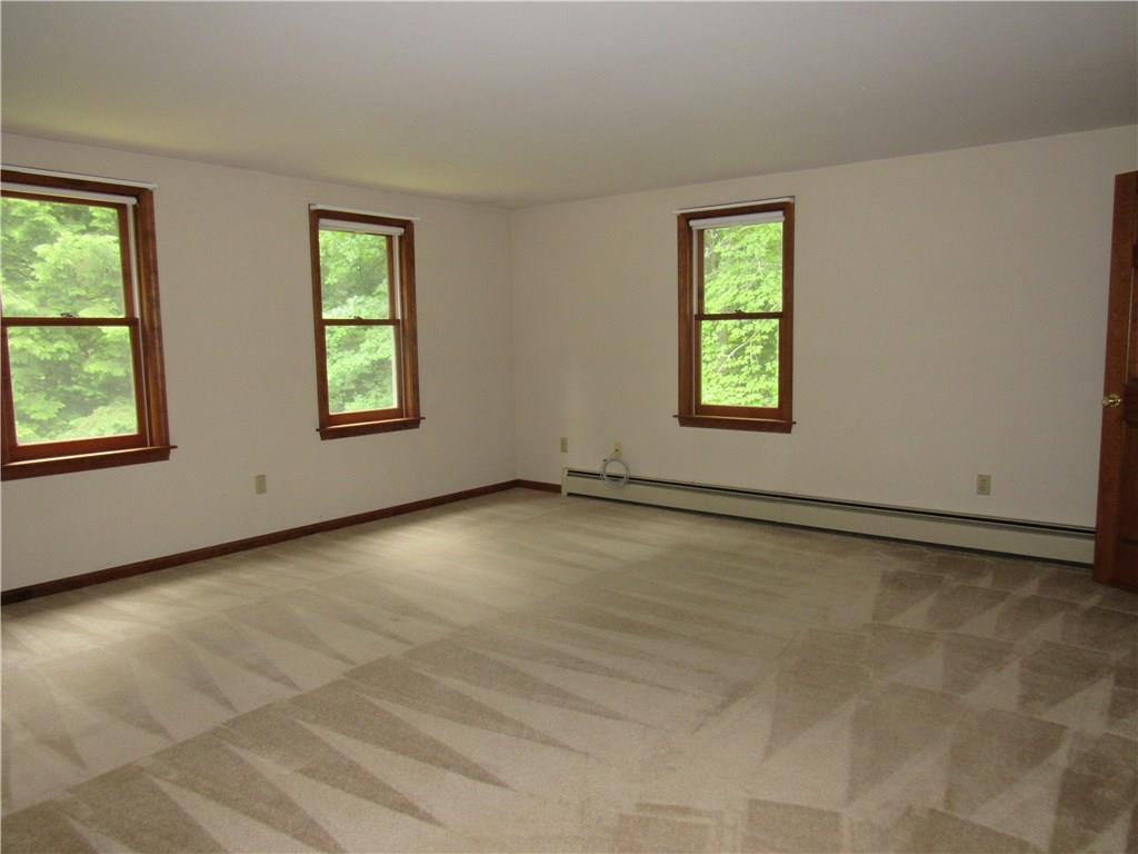 708 Cape Road Hollis Center, ME 04042 - Photo 17 of 24 A welcoming master bedroom with two...