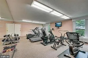 a room with furniture and a chandelier