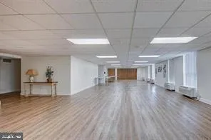 a view of a building with a yard