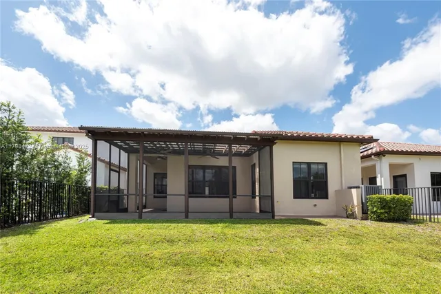 a view of a lake with a yard