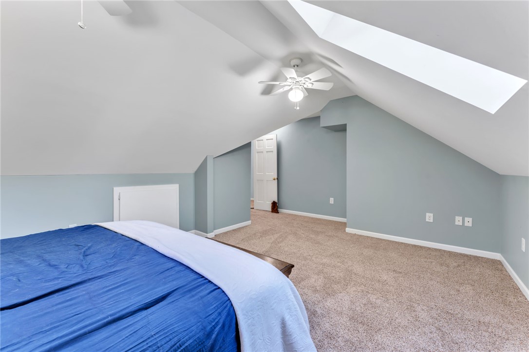 154 Hammond School Road Anderson, SC 29621 - Photo 21 of 33 This airy bedroom offers comfortable living with a skylight and soft carpet.
