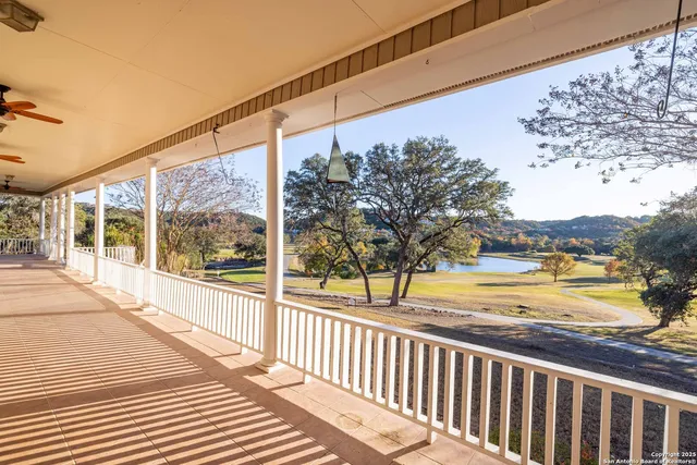 a view of a balcony with ocean view