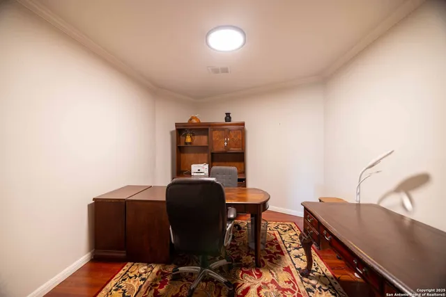 a workspace with furniture and lamp