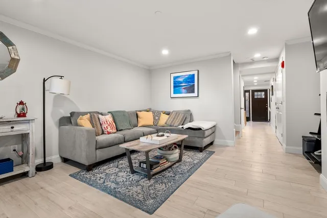 a living room with furniture and a couch