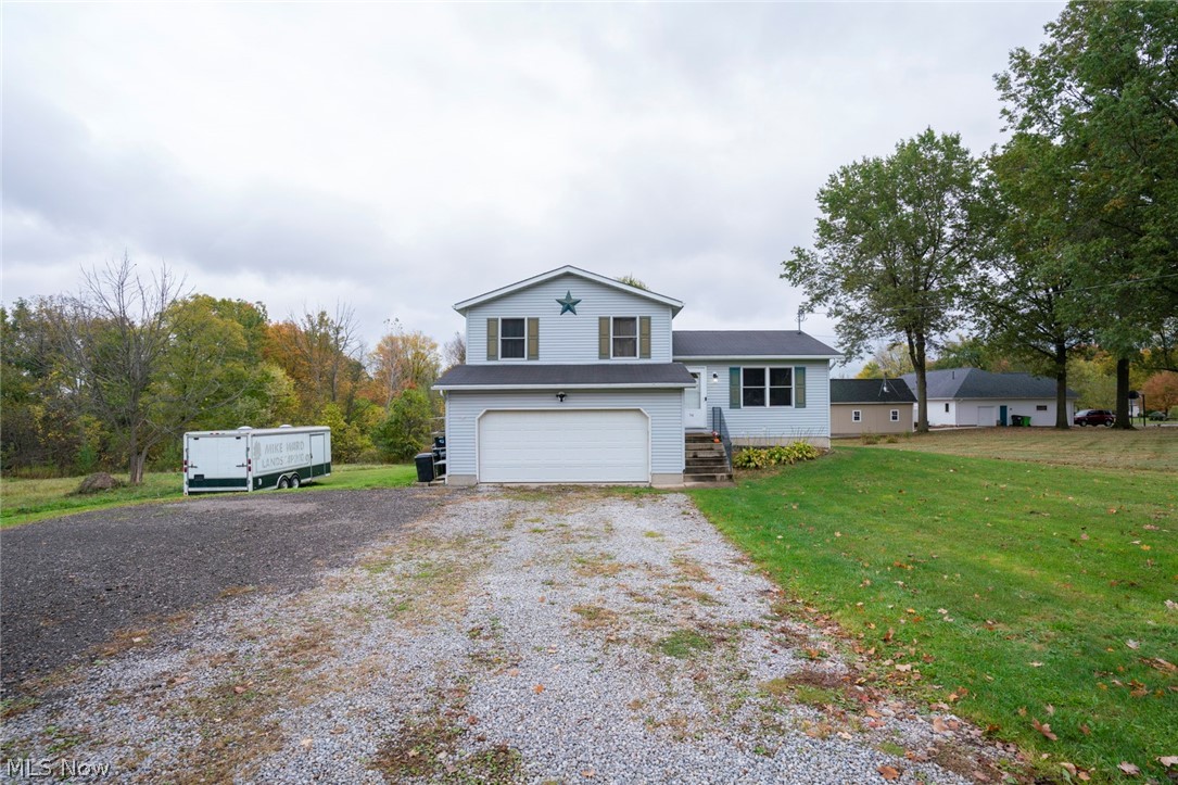 54 Elm Street Rittman, OH 44270 - Photo 2 of 35 Front view with expansive parking capability!