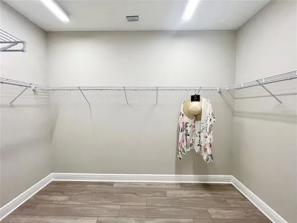 a view of a room with racks on the wall