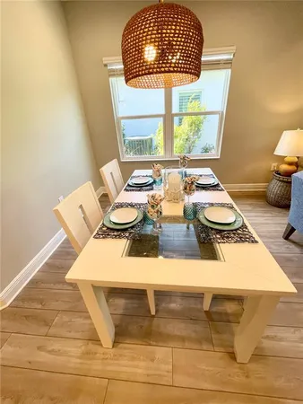 a view of a dining room with furniture