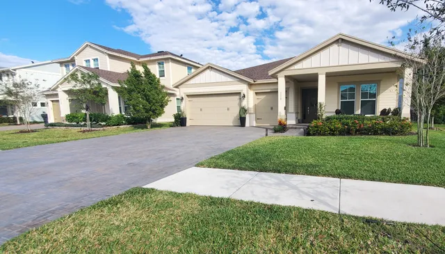 front view of a house and a yard