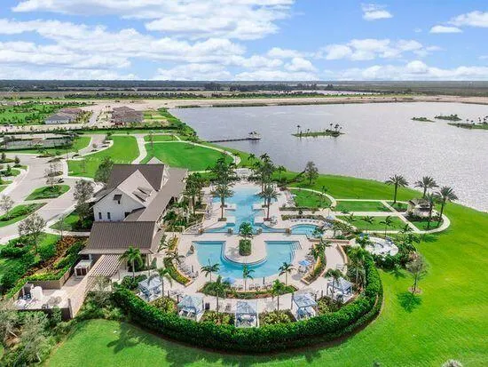 a view of a lake with a big yard