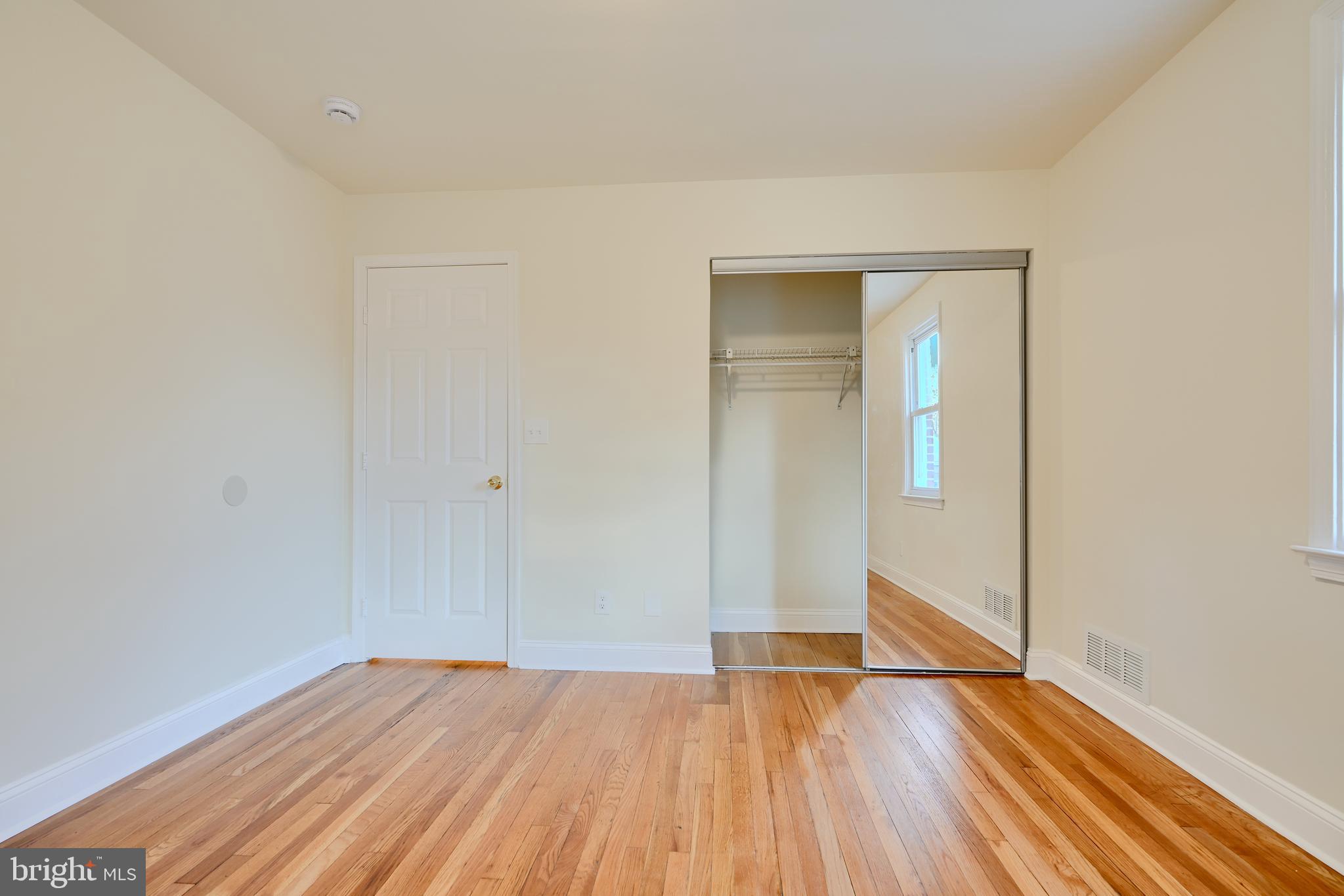 6409 Eastern Parkway Baltimore, MD 21214 - Photo 24 of 56 a view of empty room with wooden floor