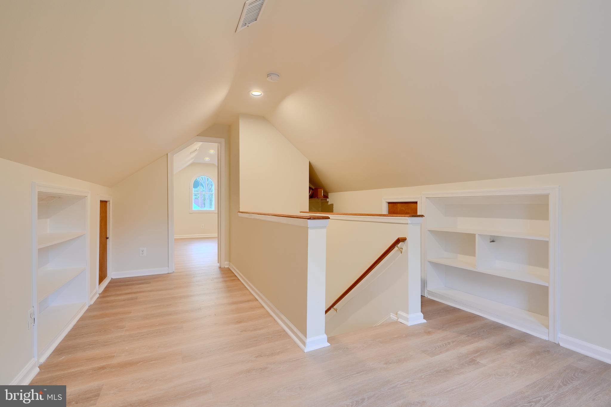 6409 Eastern Parkway Baltimore, MD 21214 - Photo 28 of 56 a view of a hallway with two white walls
