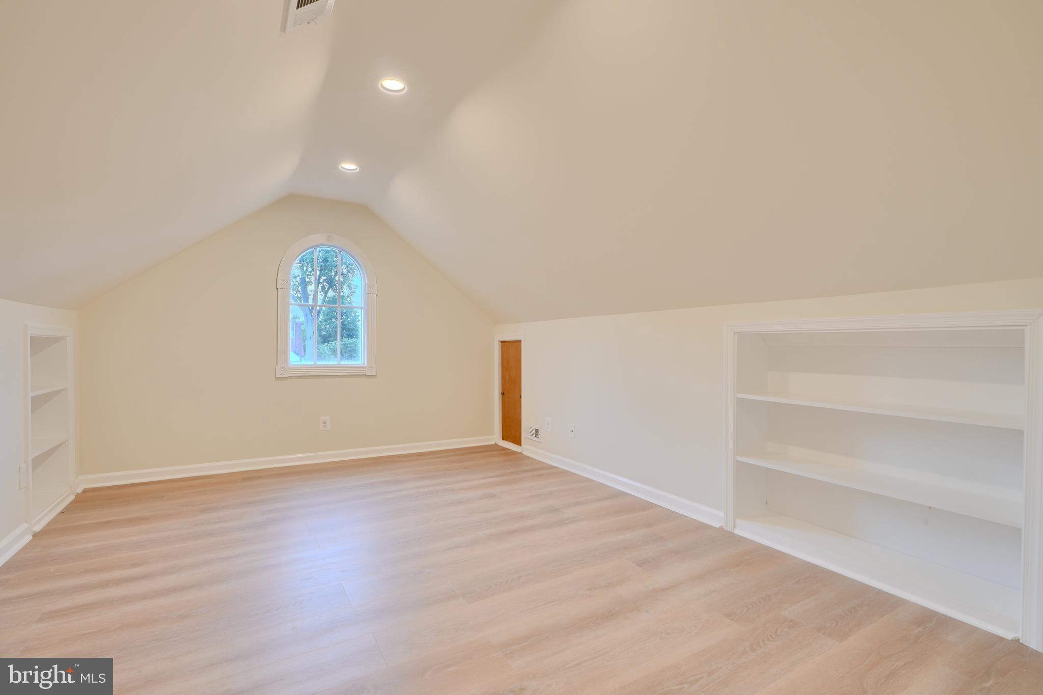 6409 Eastern Parkway Baltimore, MD 21214 - Photo 30 of 56 a view of an empty room with a window