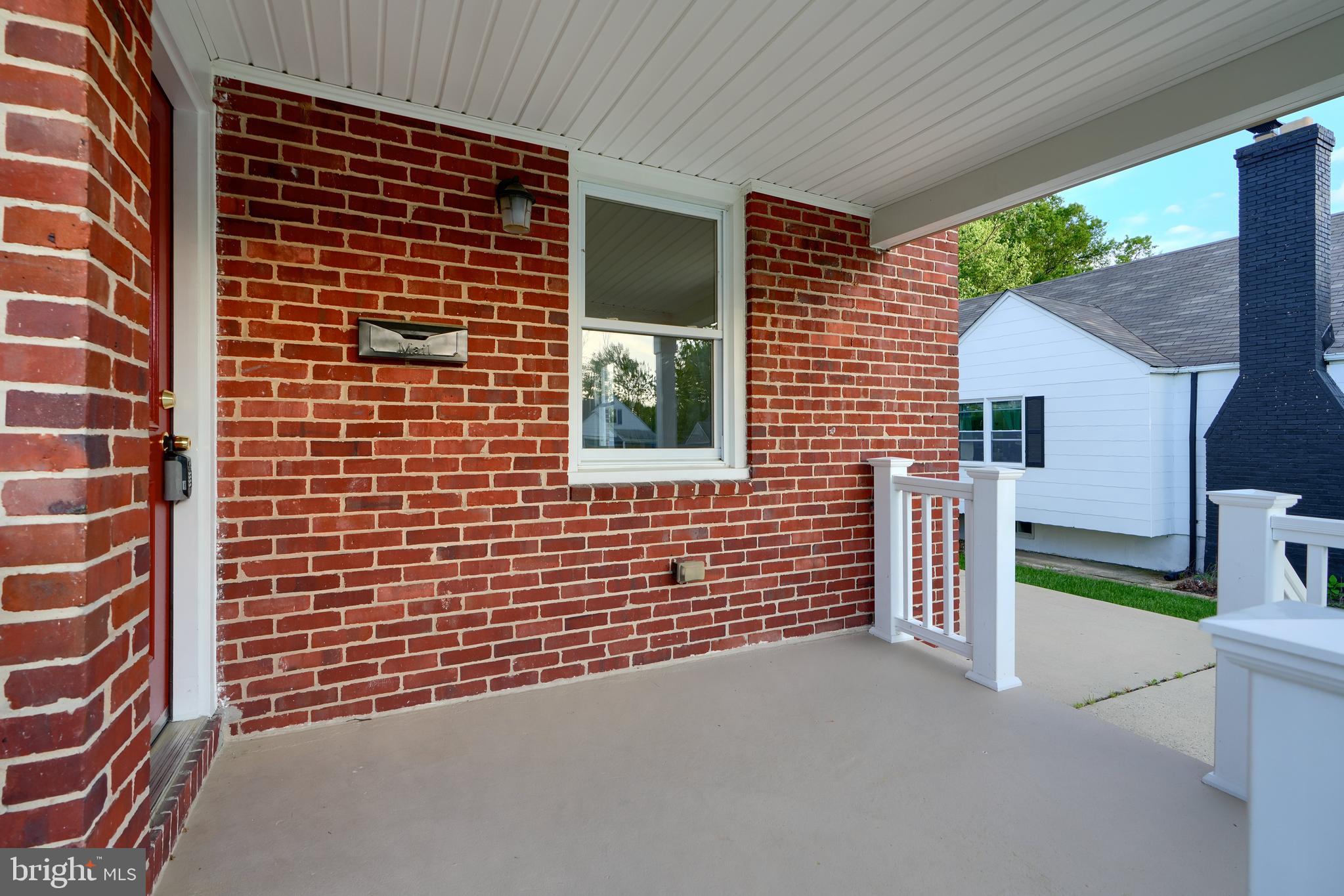 6409 Eastern Parkway Baltimore, MD 21214 - Photo 4 of 56 a view of front door of house