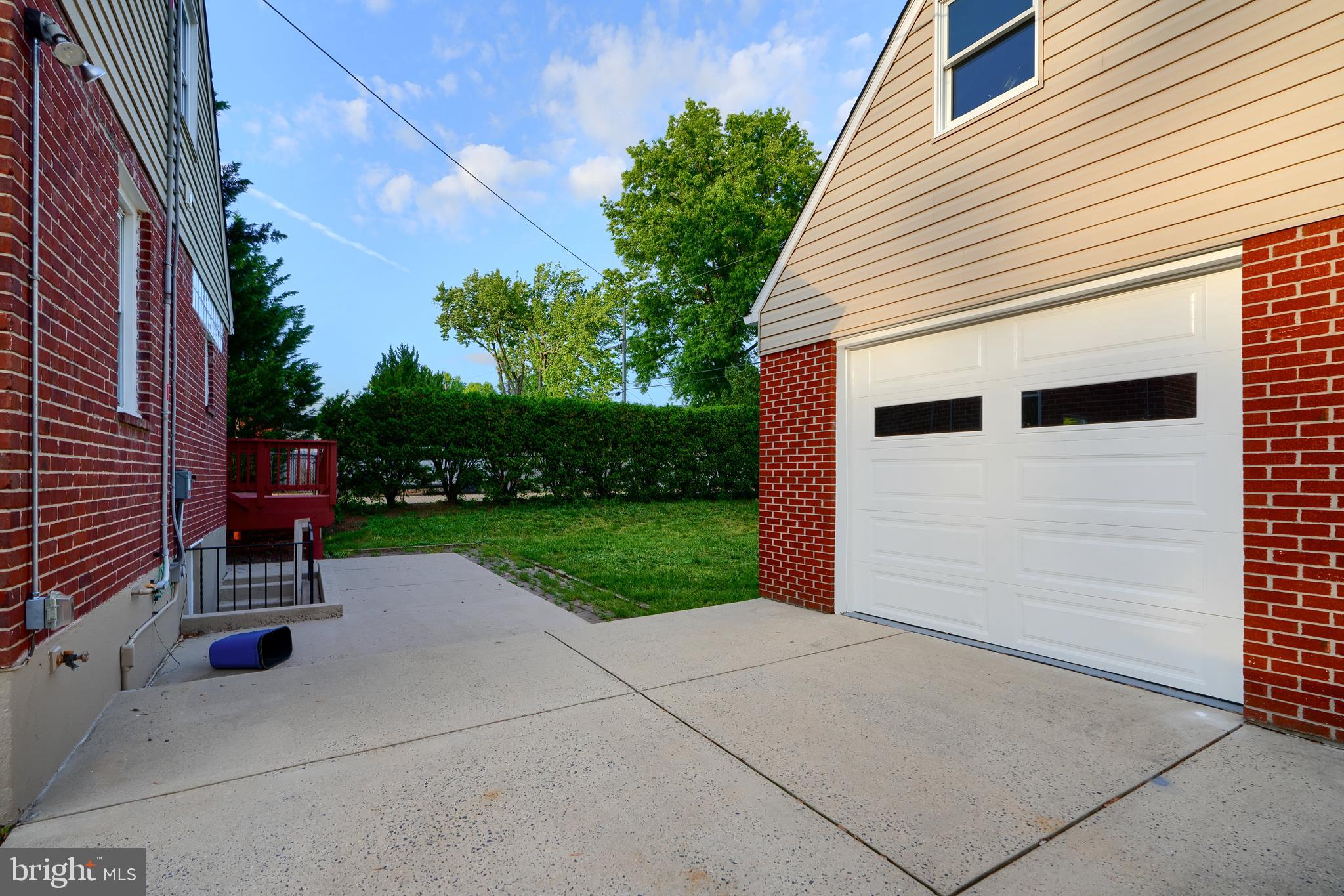 6409 Eastern Parkway Baltimore, MD 21214 - Photo 47 of 56 a view of a patio with a table and chairs and potted plants