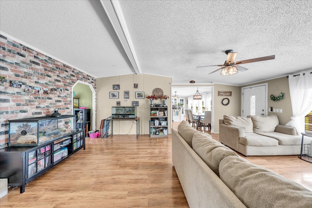 2657 Oak Grove Road Red Boiling Springs, TN 37150 - Photo 11 of 45 a living room with furniture and a baby crib