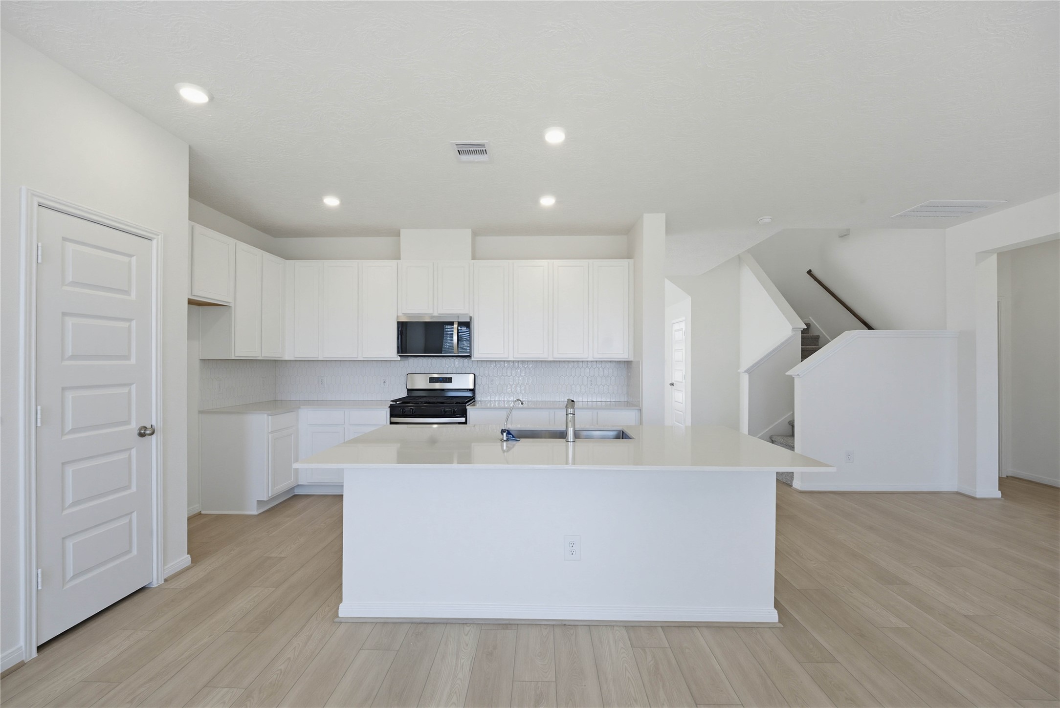 3530 Dryer Park Drive Spring, TX 77373 - Photo 12 of 31 This spacious kitchen has it all—ample storage, generous counter space, and a layout that truly makes it the heart of the home.