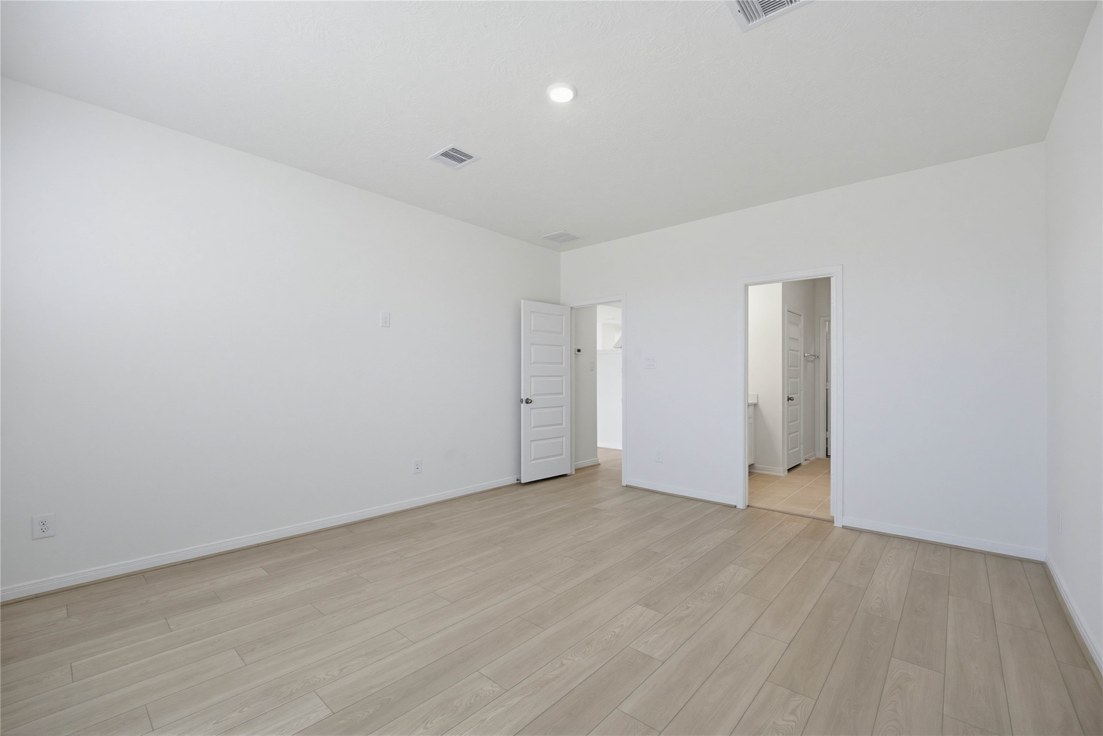 3530 Dryer Park Drive Spring, TX 77373 - Photo 16 of 31 Additional view of the primary bedroom looking towards the primary bathroom.