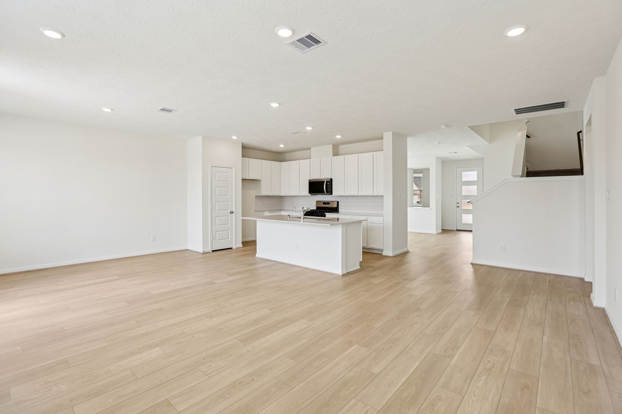 3530 Dryer Park Drive Spring, TX 77373 - Photo 16 of 48 Beautiful open-concept layout effortlessly uniting the family, dining, and kitchen spaces—ideal for everyday comfort and entertaining guests!