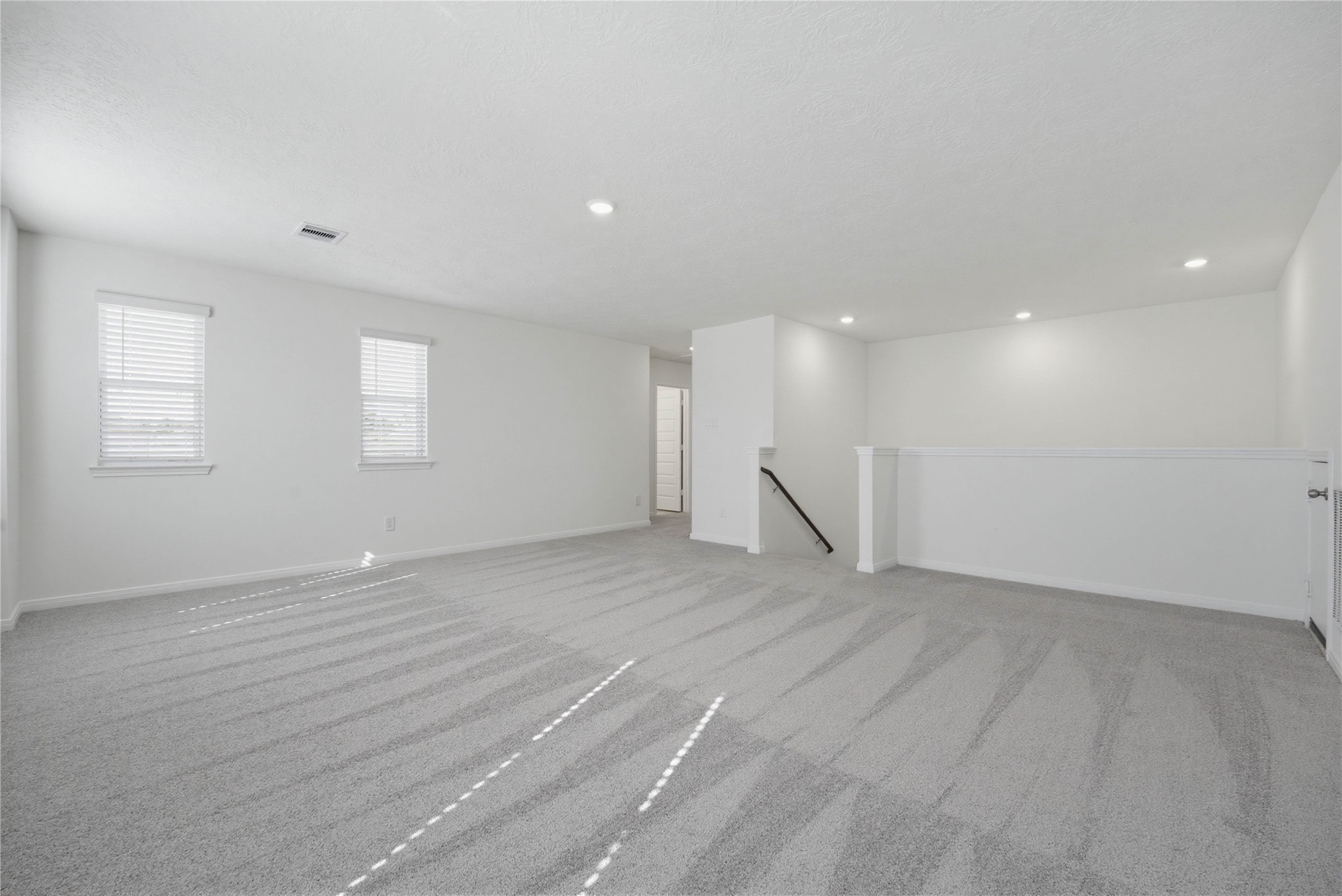 3530 Dryer Park Drive Spring, TX 77373 - Photo 20 of 31 Additional view from the game room looking towards staircase and secondary bedrooms and bathroom to the left.