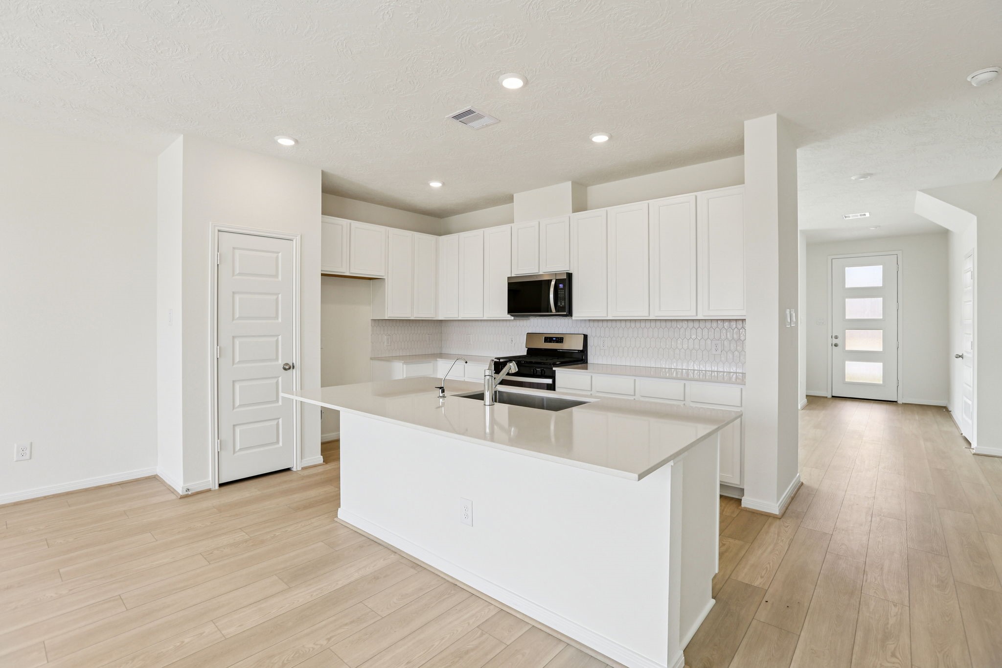 3530 Dryer Park Drive Spring, TX 77373 - Photo 20 of 48 This spacious kitchen has it all—ample storage, generous counter space, and a layout that truly makes it the heart of the home.
