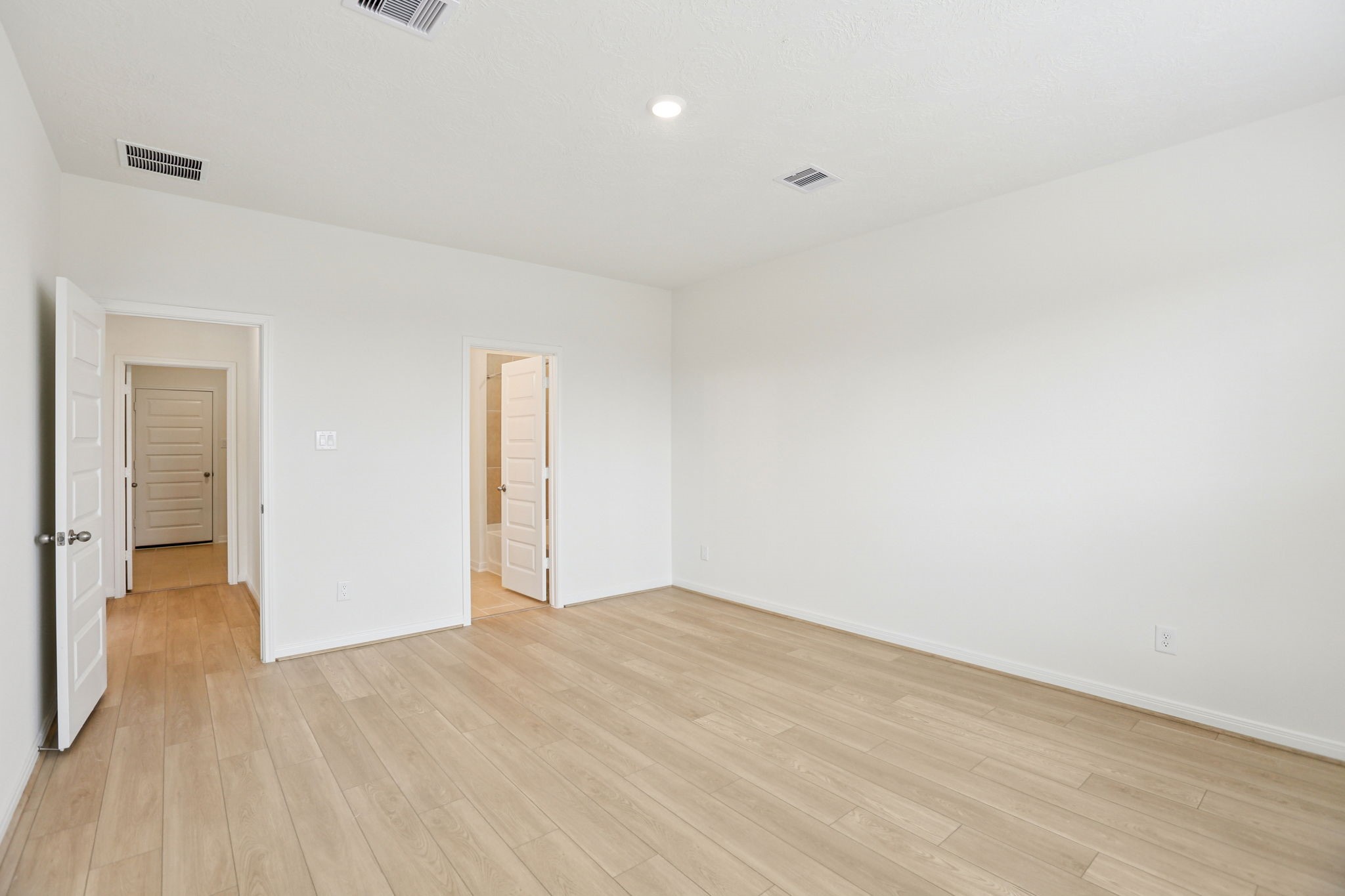 3530 Dryer Park Drive Spring, TX 77373 - Photo 24 of 48 Additional view of the primary bedroom looking towards the primary bathroom and walk-in closet.