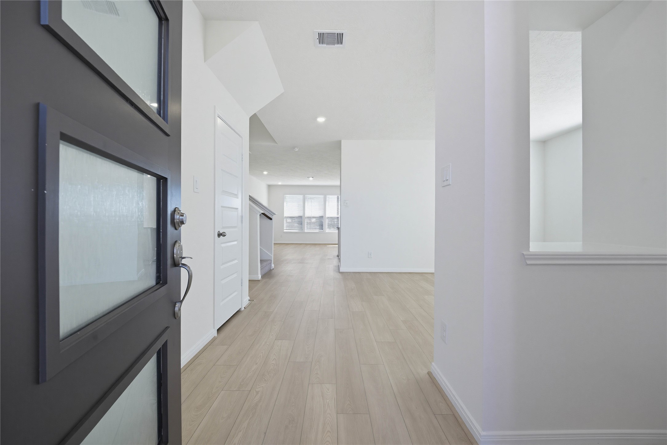 3530 Dryer Park Drive Spring, TX 77373 - Photo 4 of 31 Welcome to your new home at 3530 Dryer Park Drive. You are greeted with this beautiful entryway featuring vinyl plank flooring and custom paint.