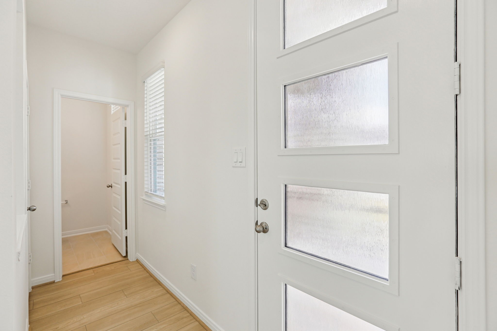 3530 Dryer Park Drive Spring, TX 77373 - Photo 7 of 48 As you enter the home, to the right is a hallway that leads to the first floor powder room.