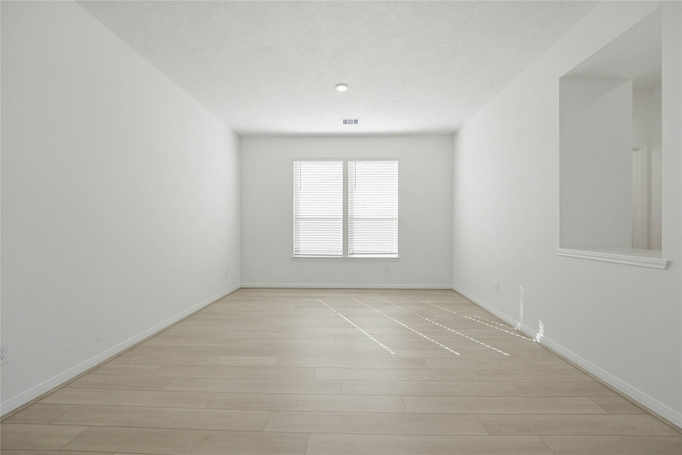 3530 Dryer Park Drive Spring, TX 77373 - Photo 7 of 31 The Flex Room is versatile space that can be used as a formal dining or living room. It features Layton Lake vinyl plank flooring in Silver Dollar, high ceilings, large windows with privacy blinds and neutral paint.
