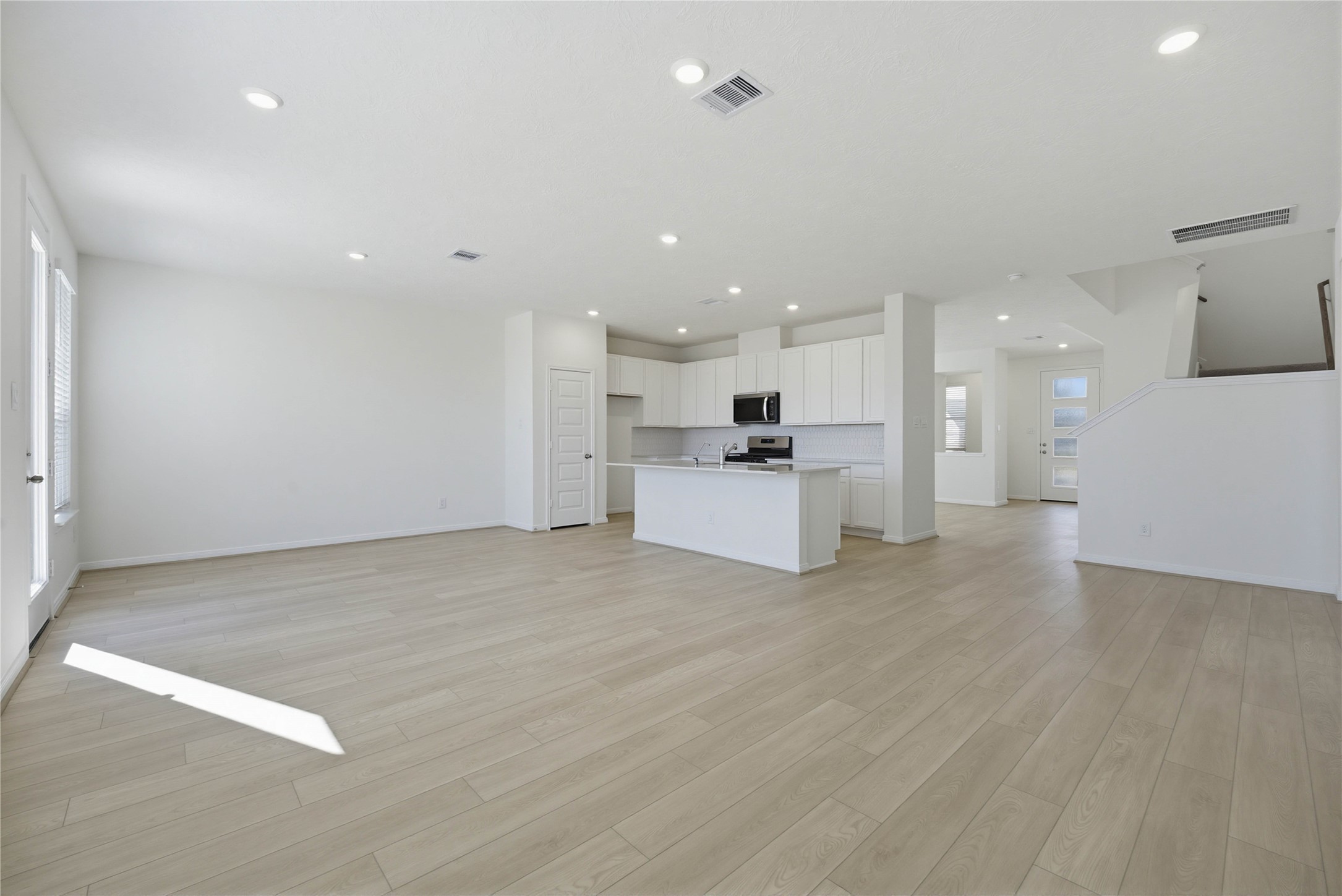 3530 Dryer Park Drive Spring, TX 77373 - Photo 10 of 31 Beautiful open-concept layout effortlessly uniting the family, dining, and kitchen spaces—ideal for everyday comfort and entertaining guests!