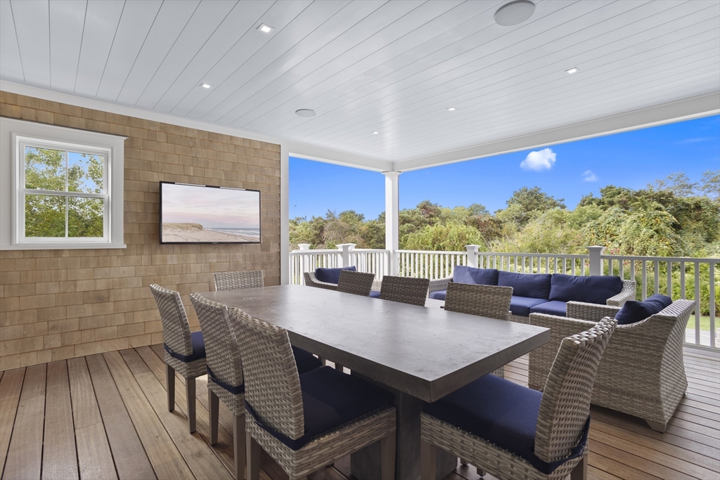 3 Old Mill Court Nantucket, MA 02554 - Photo 13 of 42 a view of a dining room with furniture and wooden floor