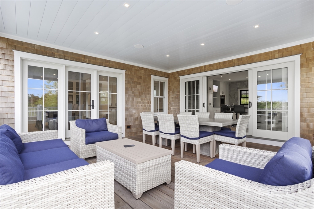 3 Old Mill Court Nantucket, MA 02554 - Photo 16 of 42 a living room with furniture and a large window