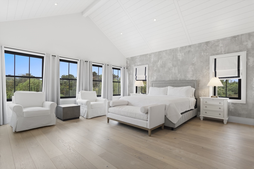 3 Old Mill Court Nantucket, MA 02554 - Photo 17 of 42 a bedroom with a large bed and a couch