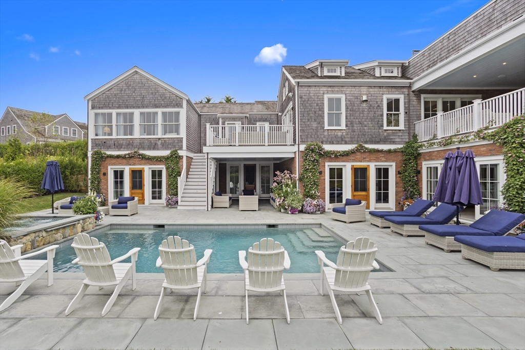 3 Old Mill Court Nantucket, MA 02554 - Photo 2 of 42 a front view of a building with outdoor seating