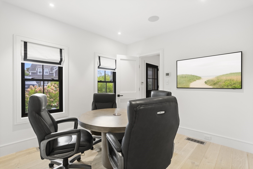 3 Old Mill Court Nantucket, MA 02554 - Photo 23 of 42 a living room with furniture and a window