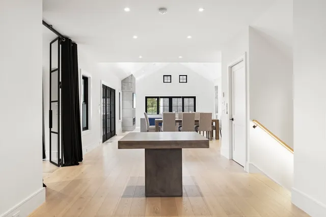 a lobby with furniture and a table