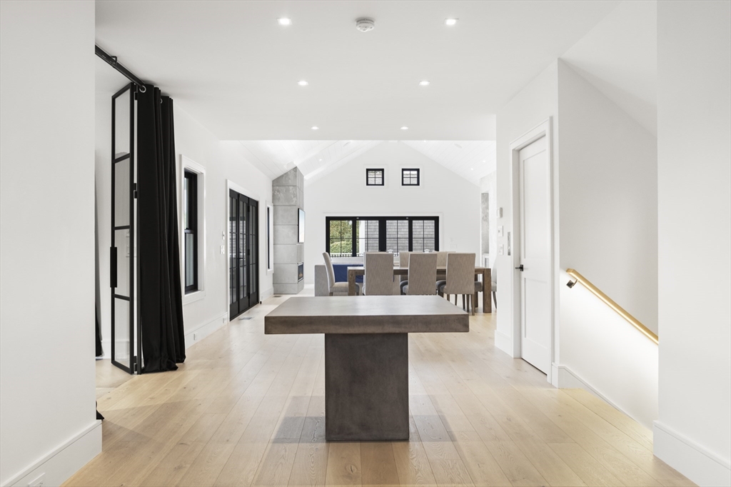 3 Old Mill Court Nantucket, MA 02554 - Photo 3 of 42 a lobby with furniture and a table
