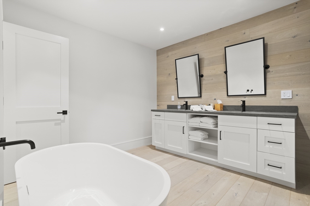 3 Old Mill Court Nantucket, MA 02554 - Photo 37 of 42 a bathroom with a sink and a mirror