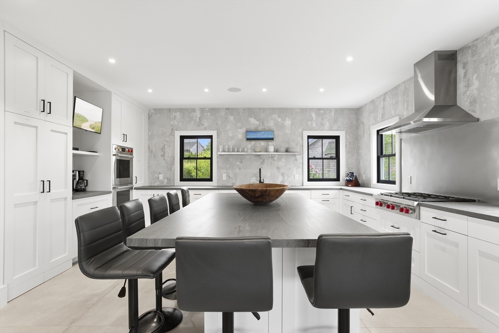 3 Old Mill Court Nantucket, MA 02554 - Photo 4 of 42 a view of kitchen and dining area with furniture