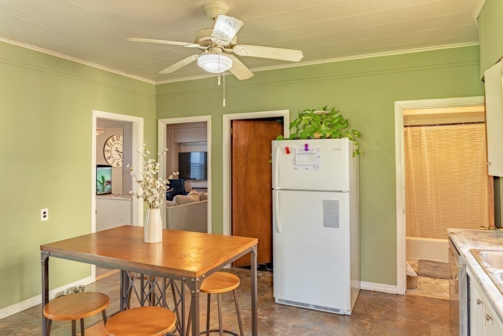195 Barnaby Street Fall River, MA 02720 - Photo 14 of 25 a dining room with a table and chairs