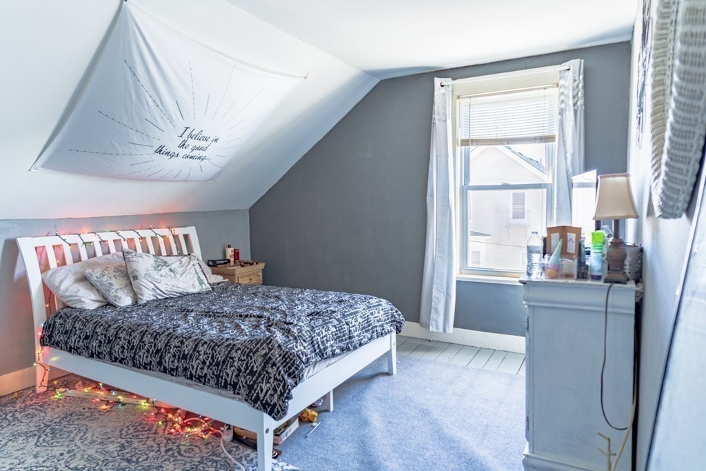 195 Barnaby Street Fall River, MA 02720 - Photo 16 of 25 a bedroom with a bed and a window