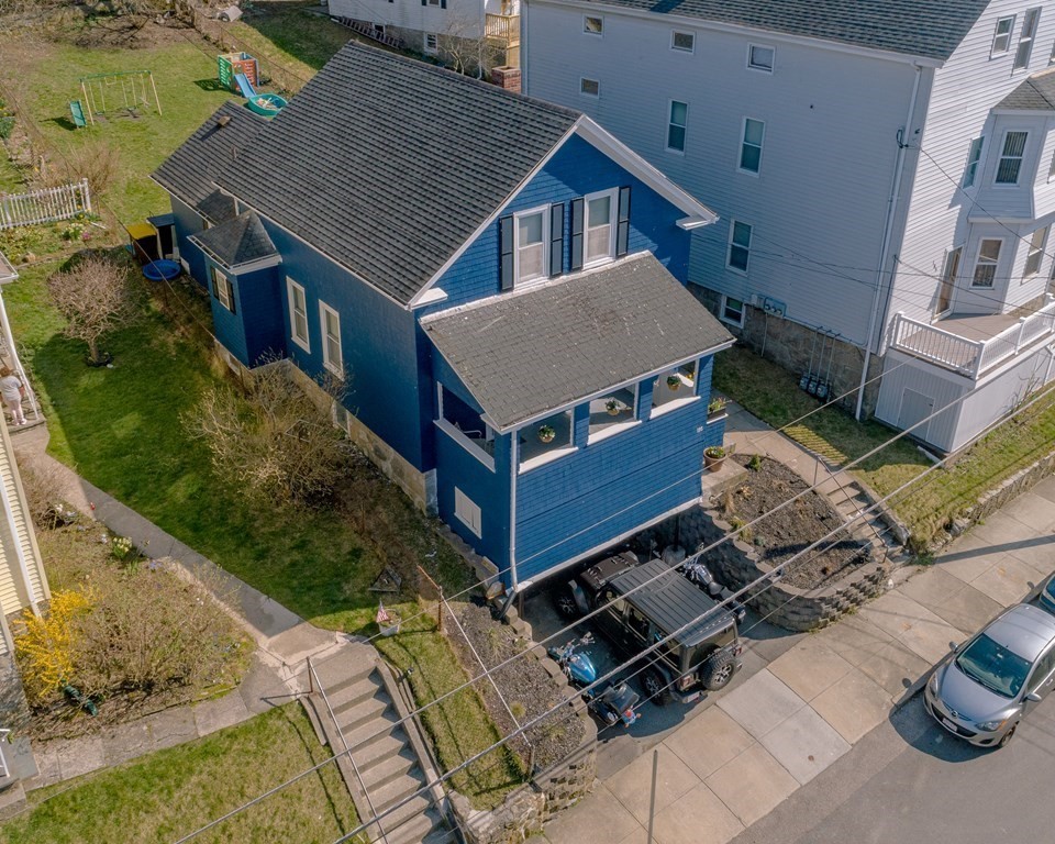 195 Barnaby Street Fall River, MA 02720 - Photo 2 of 25 an aerial view of a house with a yard