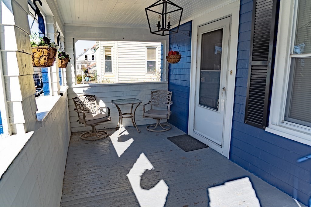 195 Barnaby Street Fall River, MA 02720 - Photo 6 of 25 a living room with furniture and a window