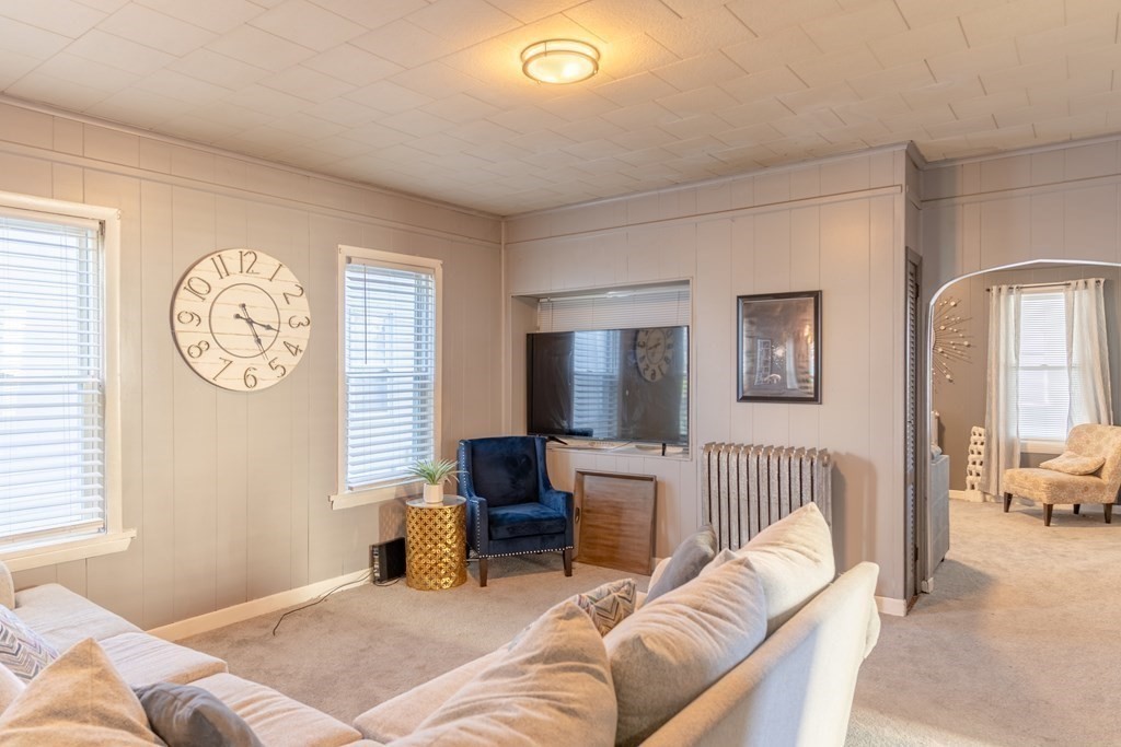 195 Barnaby Street Fall River, MA 02720 - Photo 9 of 25 a bedroom with furniture and a window