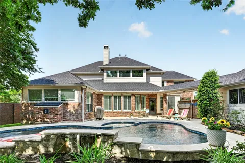 $699,000 | 10111 Earlington Manor Drive, Spring, TX 77379